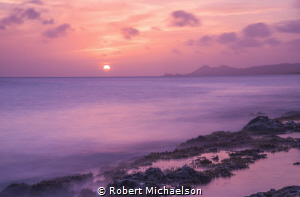 Sunset at the Jeff Davis, MD Memorial Dive Site in Bonaire by Robert Michaelson 